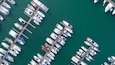 Pier speedboat. A marina lot. This is usually the most popular tourist attractions on the beach.Yacht and sailboat is moored at the quay.Aerial view by drone.Top view.