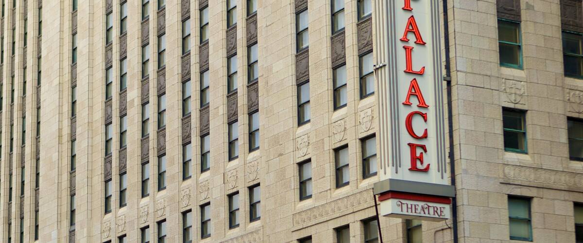 Palace Theatre showing a hotel, theater scenes and signage