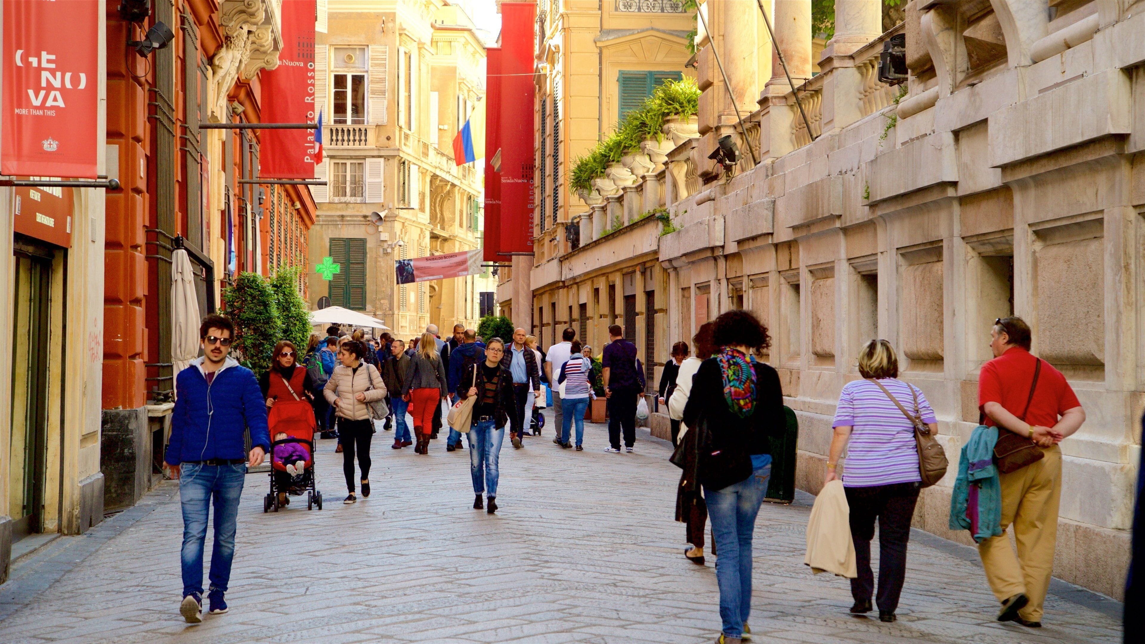 Via Garibaldi featuring street scenes as well as a small group of people