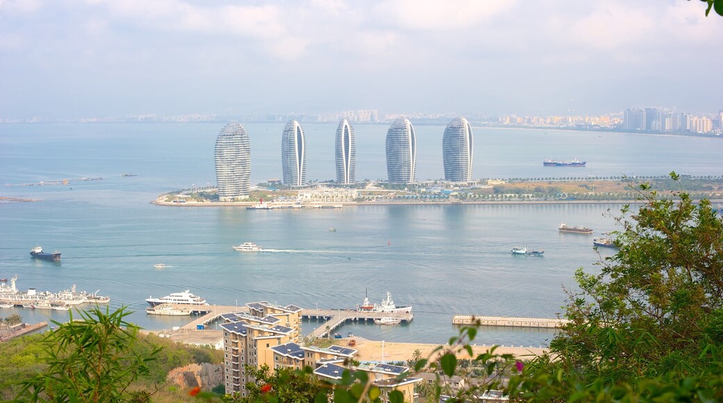 Luhuitou Park showing a bay or harbour and a skyscraper
