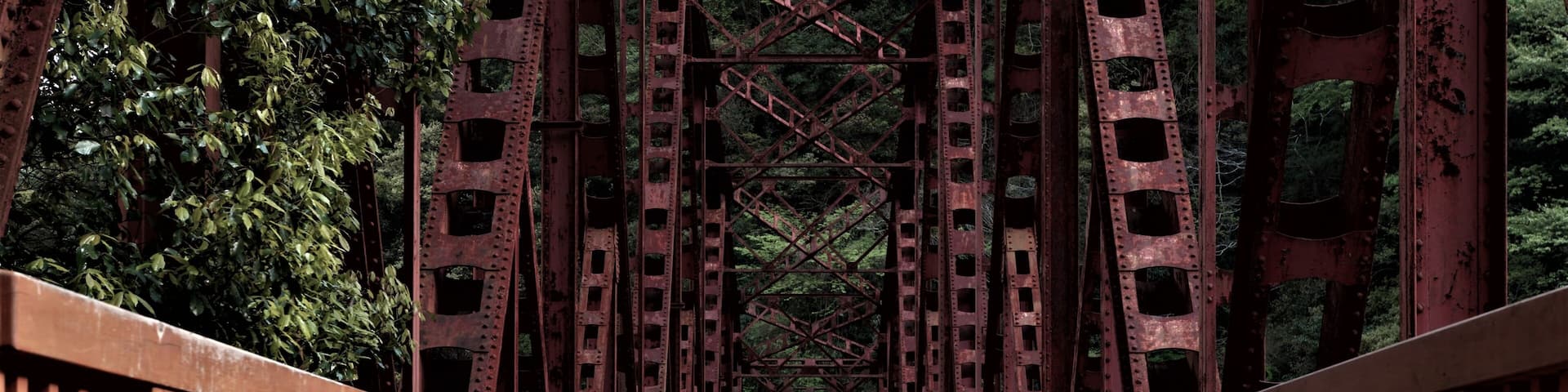 Abandoned red railway bridge. Fukuchiyama Railway