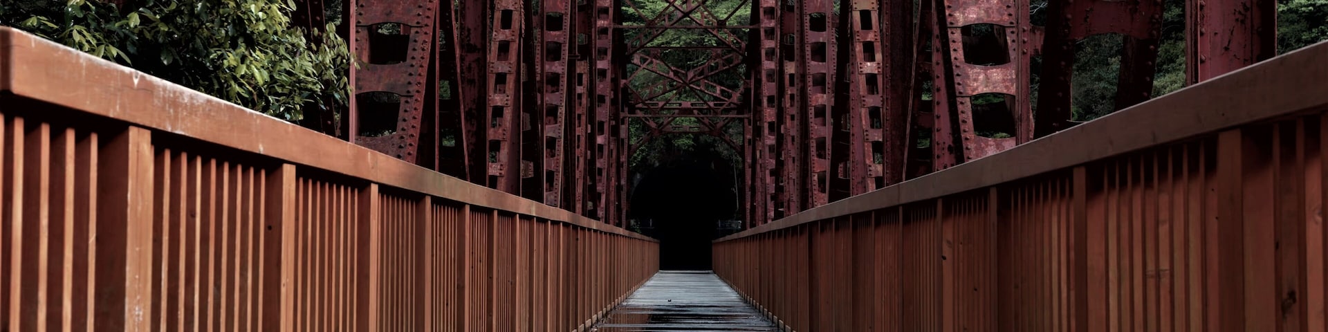 Abandoned red railway bridge. Fukuchiyama Railway