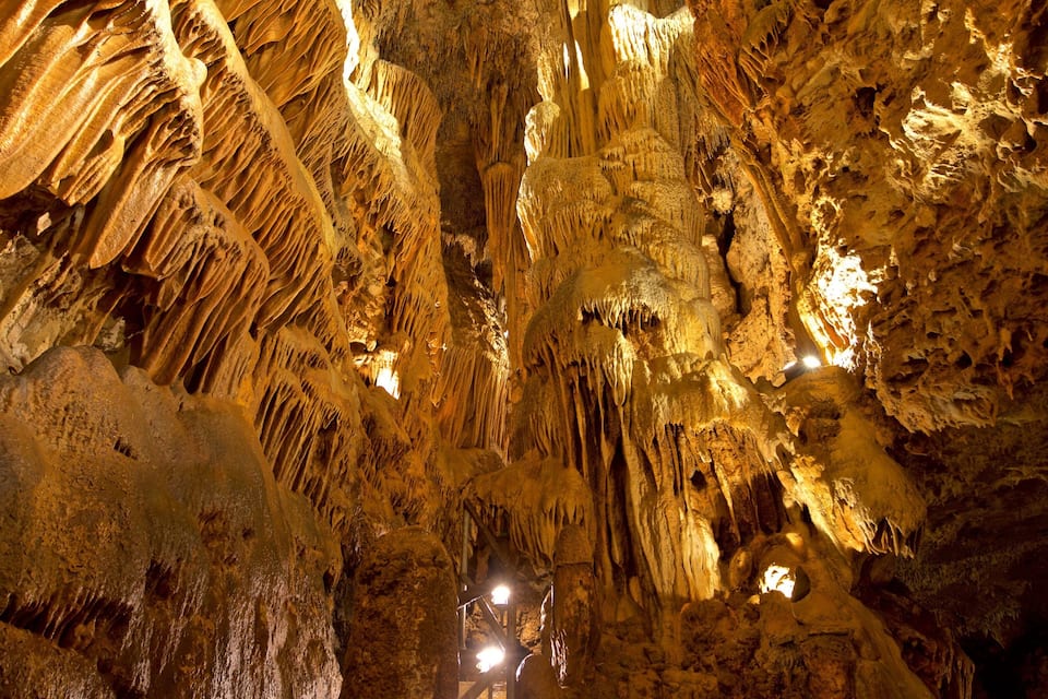 A cave with stalactites and stalagmites.