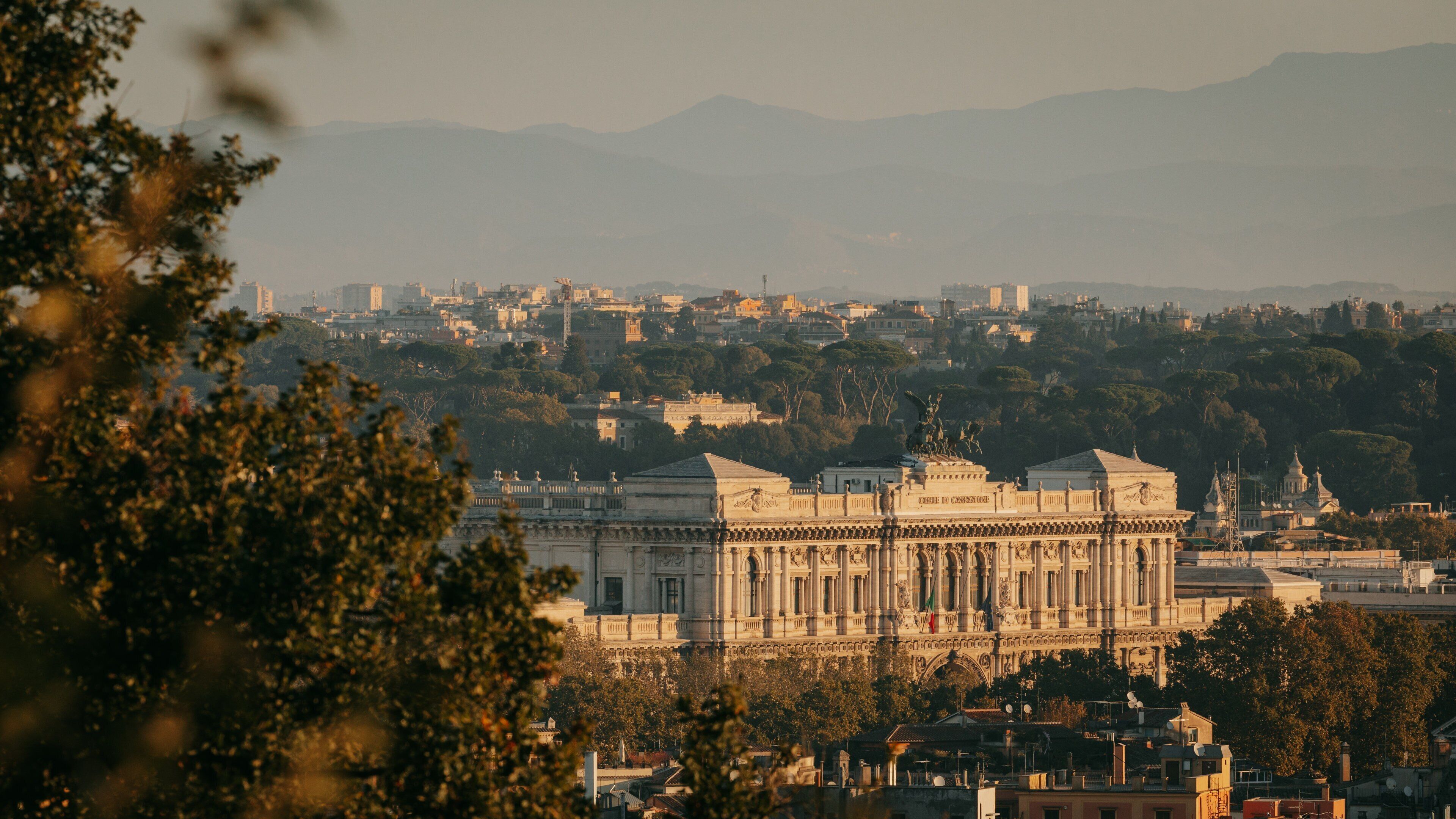 Passeggiata del Gianicolo which includes heritage architecture, landscape views and a sunset