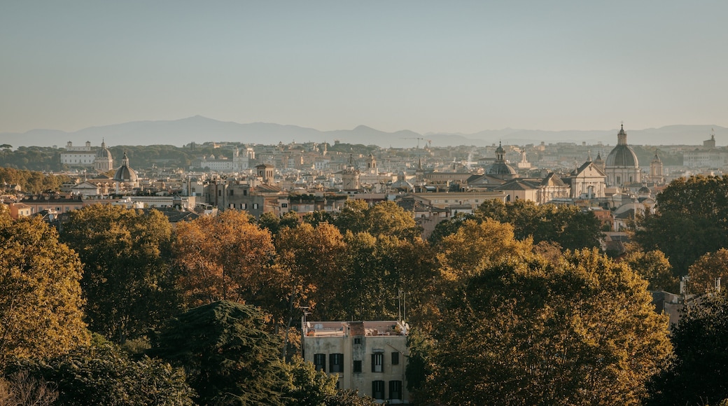 Passeggiata del Gianicolo featuring landscape views, a sunset and a city