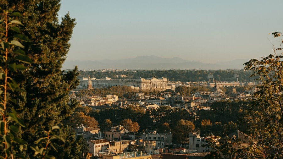 Passeggiata del Gianicolo featuring landscape views, a sunset and a city