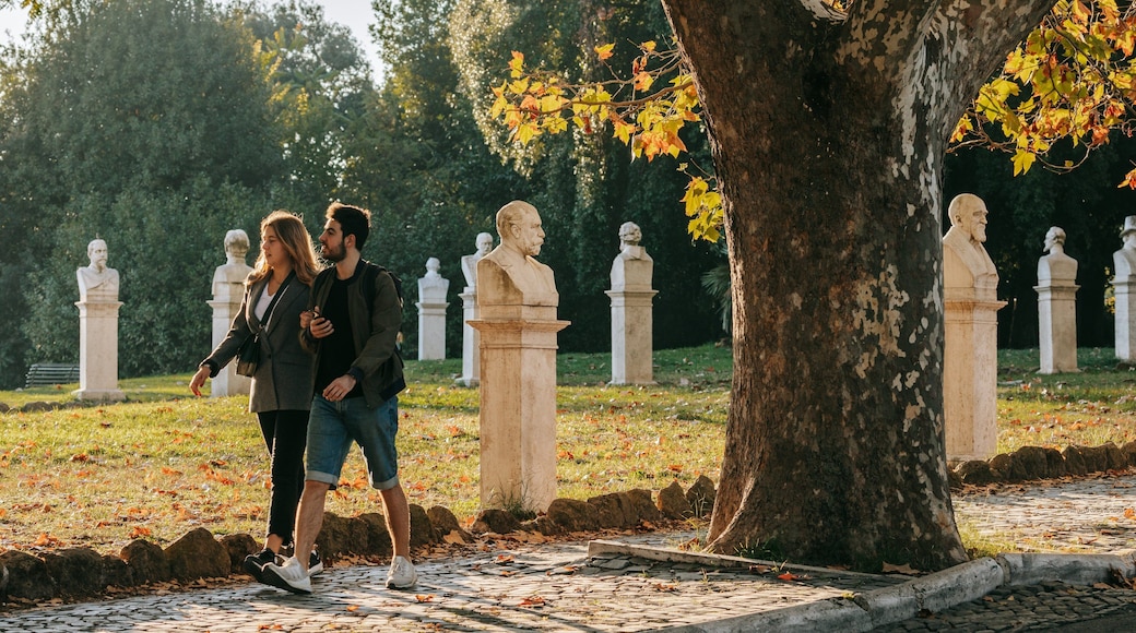 Passeggiata del Gianicolo showing a garden and a sunset as well as a couple