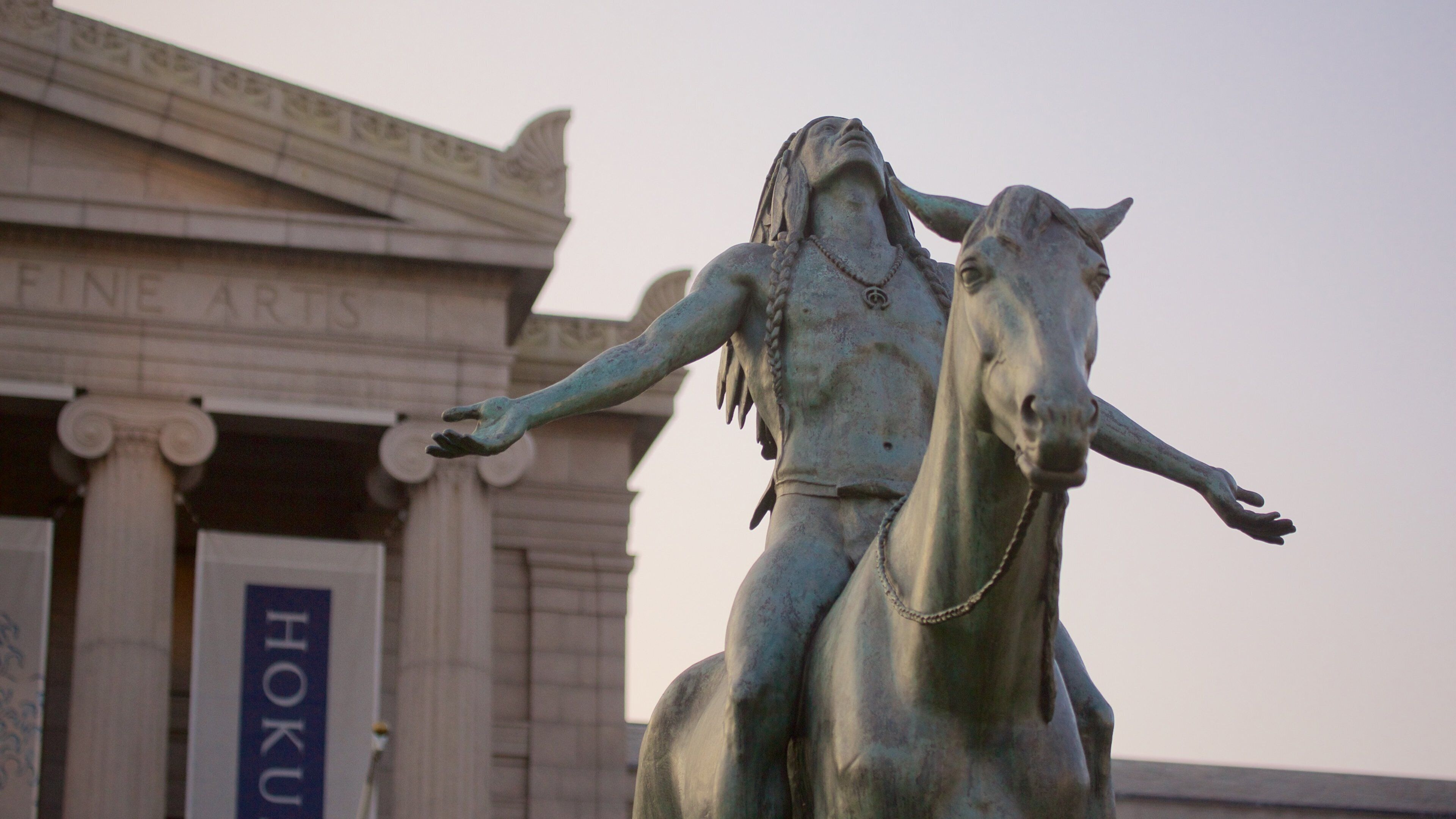 Kenmore Square which includes a statue or sculpture