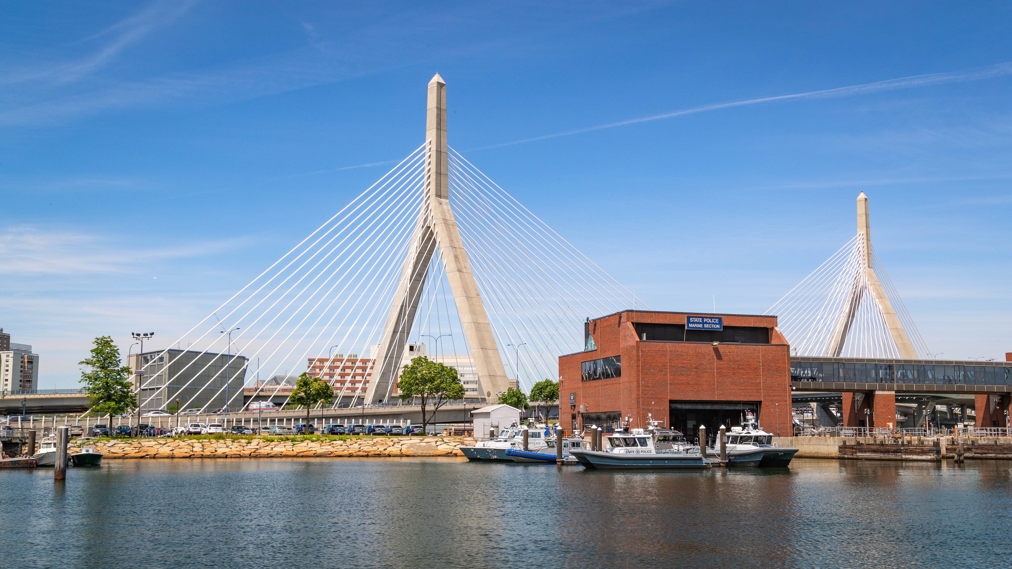 Zakim Bunker Hill Bridge which includes a bay or harbor and a bridge