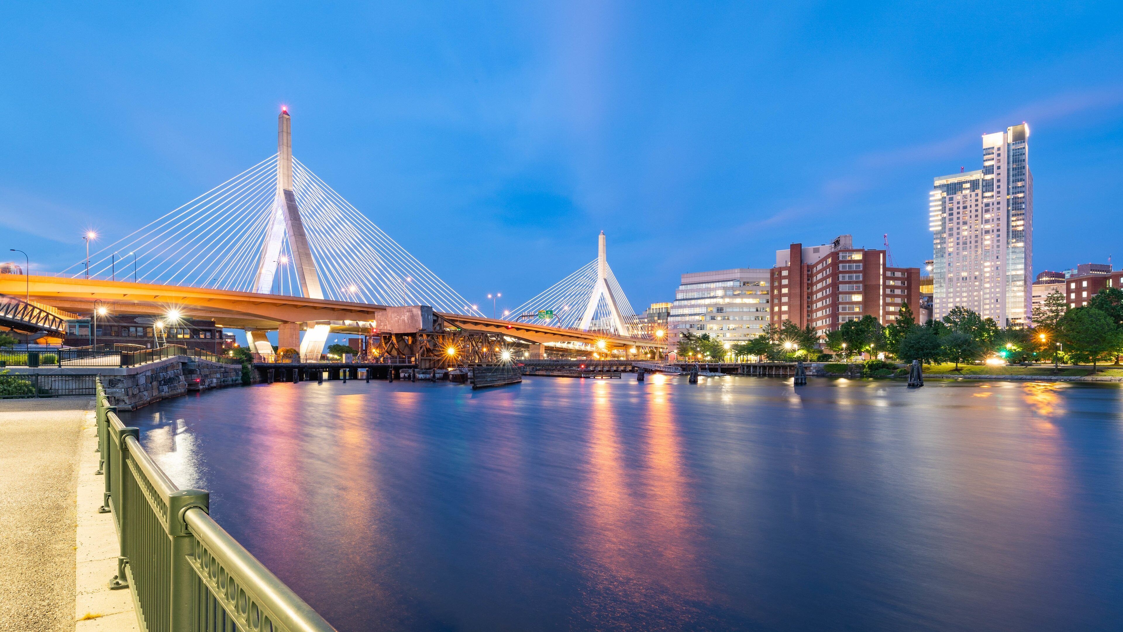 Zakim Bunker Hill Bridge showing a city, night scenes and a river or creek