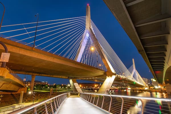 Zakim Bunker Hill Bridge showing night scenes, a bridge and a bay or harbor