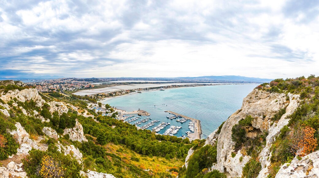 Panoramic view of Cagliari city, Sardinia island, Italy. View from the Devils Saddle (La Sella del Diavolo). Il Poetto beach on the right