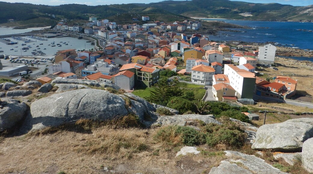 There's an amazing view from the top of the hill towards the town of Muxía. You can walk to it easily from the parking lot at the lighthouse.