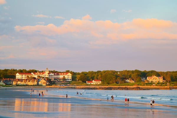 Gooch\'s Beach featuring a sunset, a coastal town and a sandy beach