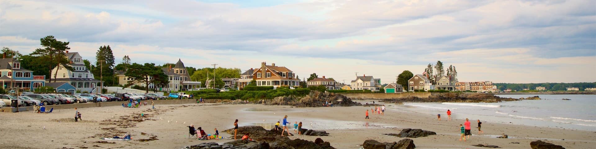 Mother\'s Beach showing general coastal views, a sunset and a coastal town