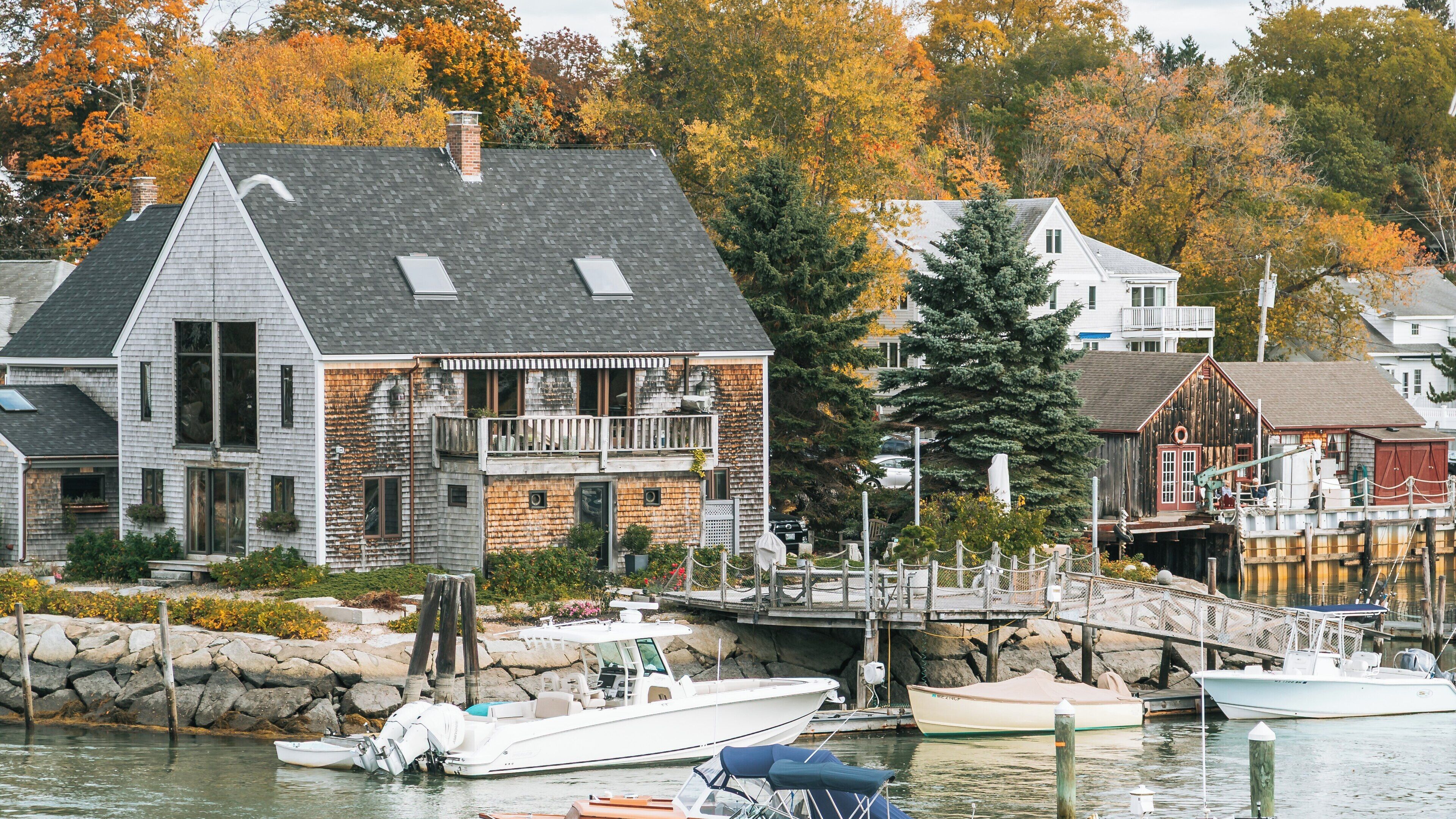 Enjoying the serene beauty of Mother's Beach in Kennebunkport, Maine during a crisp autumn day with colorful foliage and peaceful waterfront activities