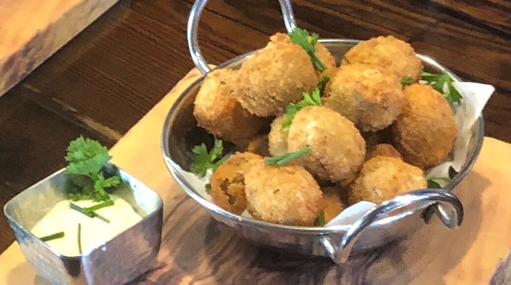 #goodeats beer battered deep fried green olives stuffed with bleu cheese and served with a garlic truffle aioli