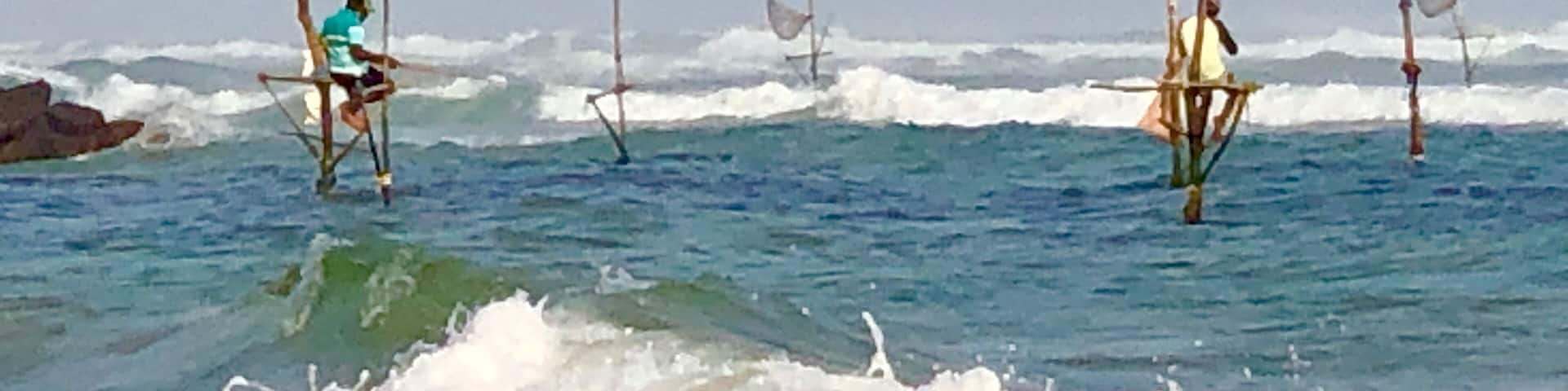 Fisherman fishing on stilt