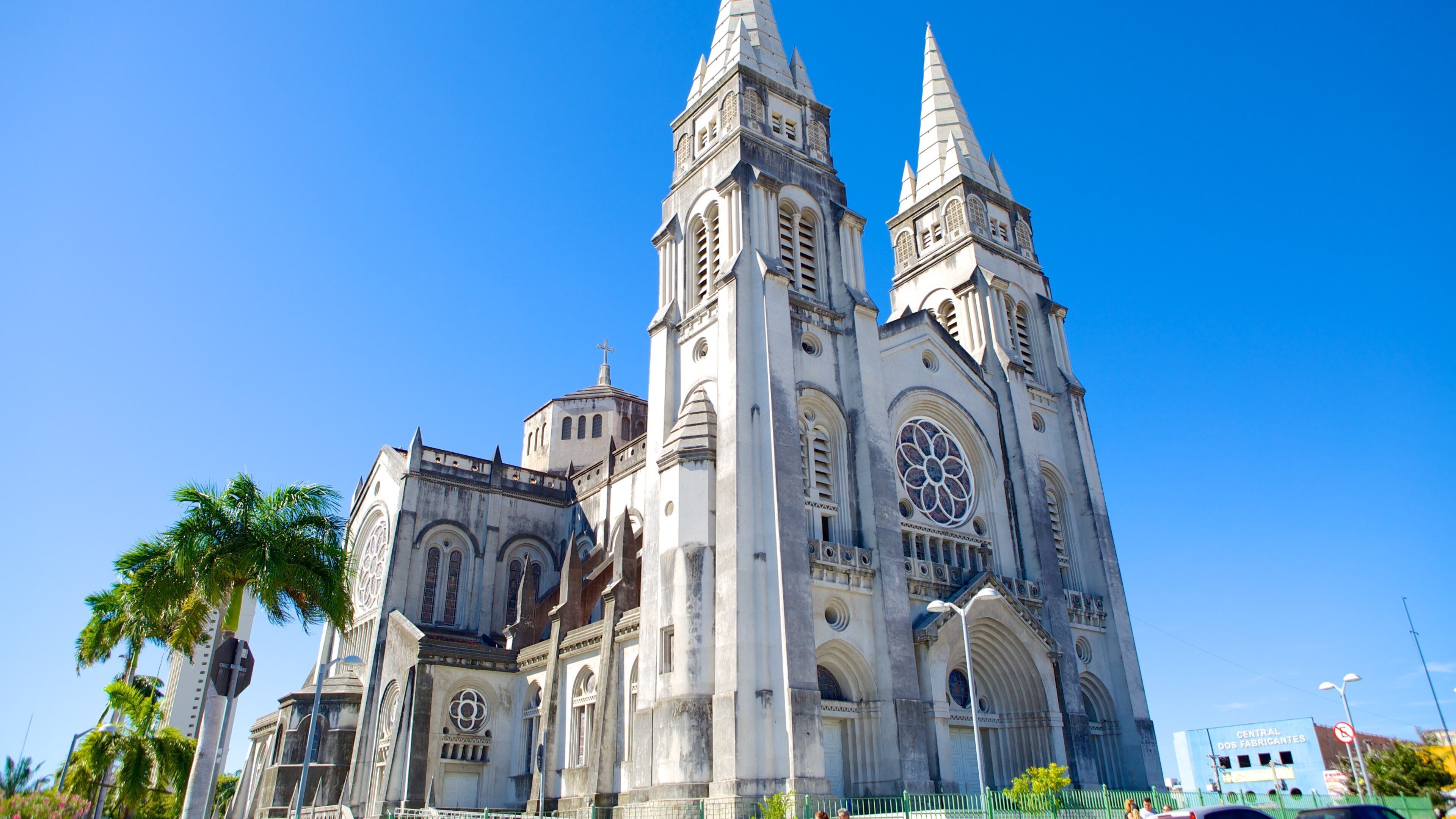 A large cathedral with two tall spires and a large rose window.