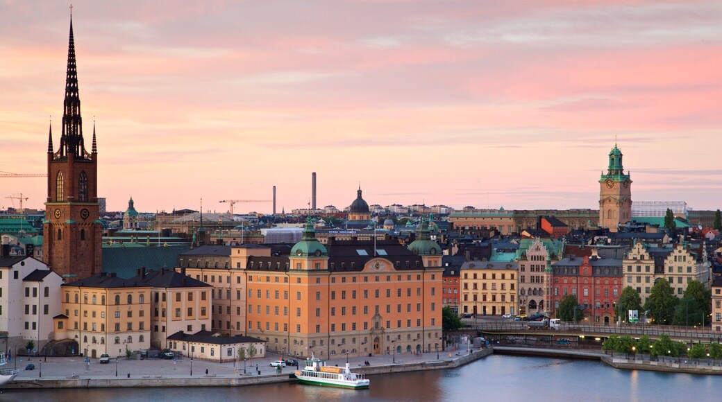 Monteliusvagen featuring heritage architecture, landscape views and a bay or harbor