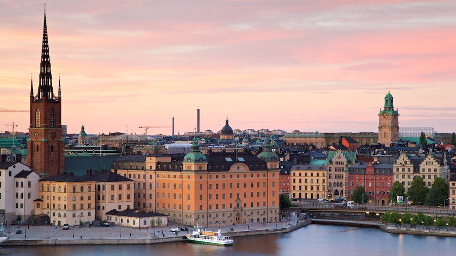 Monteliusvagen featuring heritage architecture, landscape views and a bay or harbor