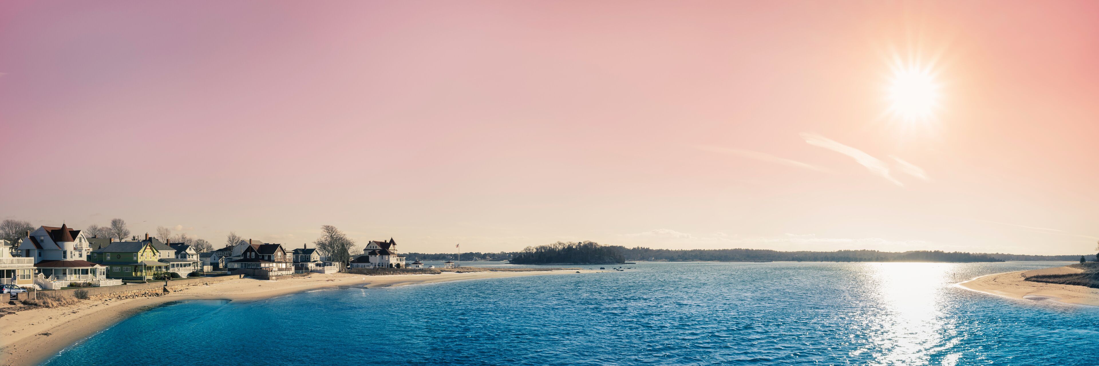 Sunset seascape over Buzzards Bay with the view of Wickets Island and Stash's Onset Beach in Massachusetts
