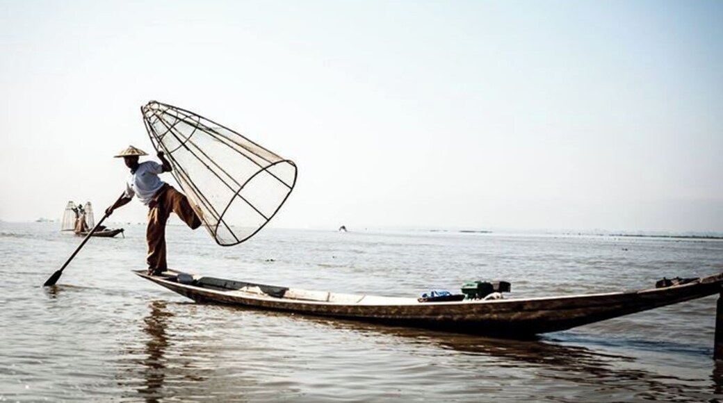 Fishing dance, that man is a Myanmar fisher, he living Inle, live by fishing. #Blue