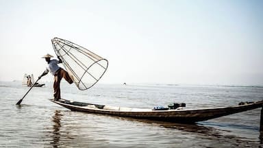Fishing dance, that man is a Myanmar fisher, he living Inle, live by fishing. #Blue