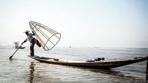 Fishing dance, that man is a Myanmar fisher, he living Inle, live by fishing. #Blue