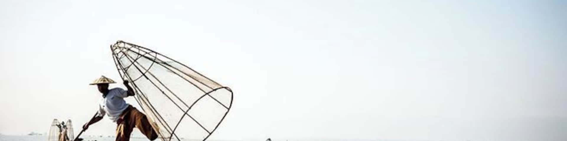 Fishing dance, that man is a Myanmar fisher, he living Inle, live by fishing.   #Blue