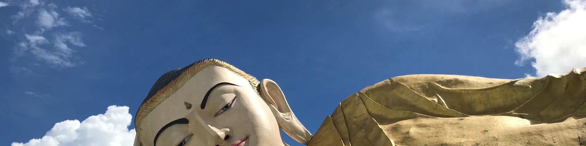 Buddha in blue sky
