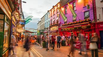 Latin Quarter which includes night scenes and street scenes