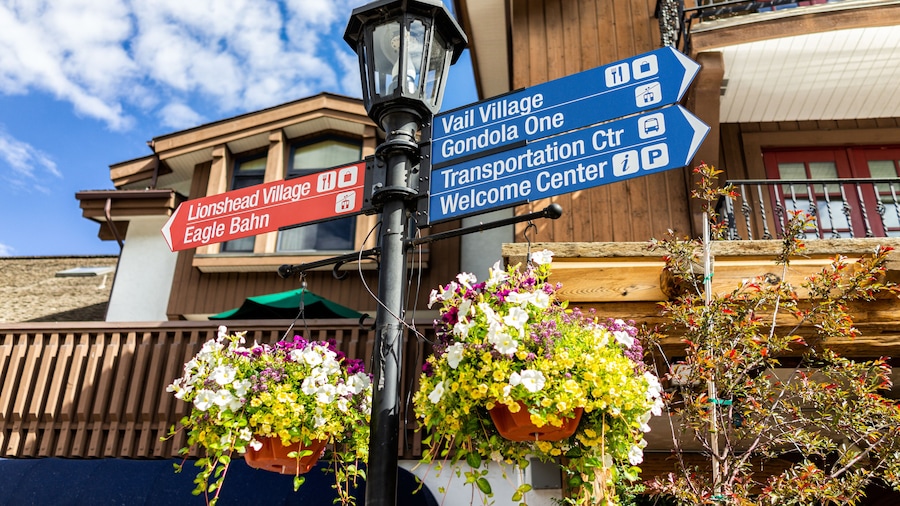 Vail, Colorado ski resort directional sign in rocky mountains for welcome and transportation center in village