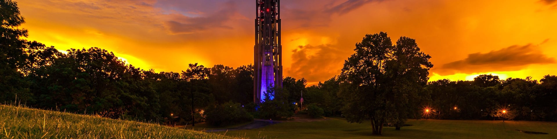 Naperville's Carillon rises above Rotary Hill at sunset just after a passing storm