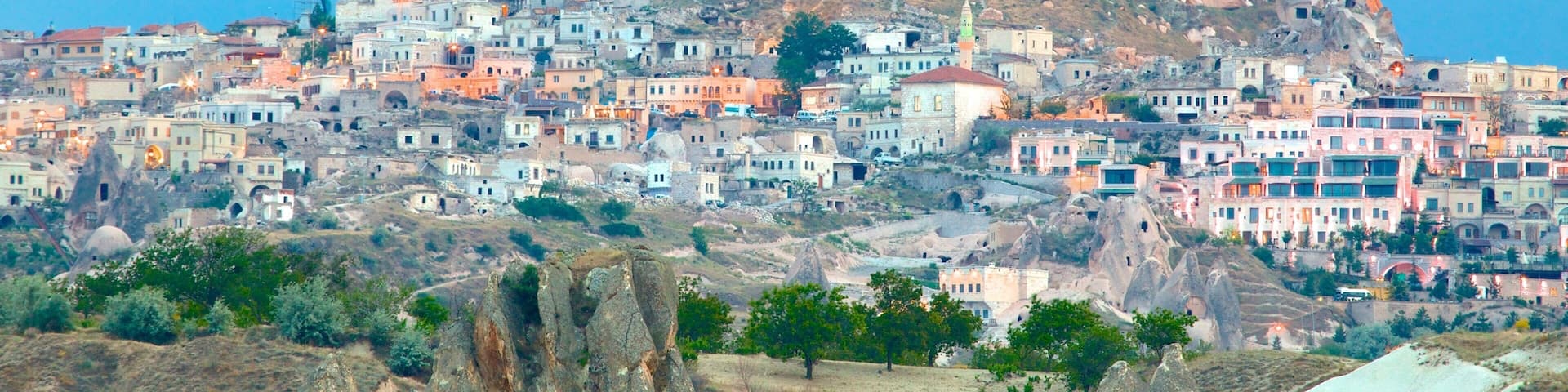 Uchisar Castle featuring a city and heritage architecture