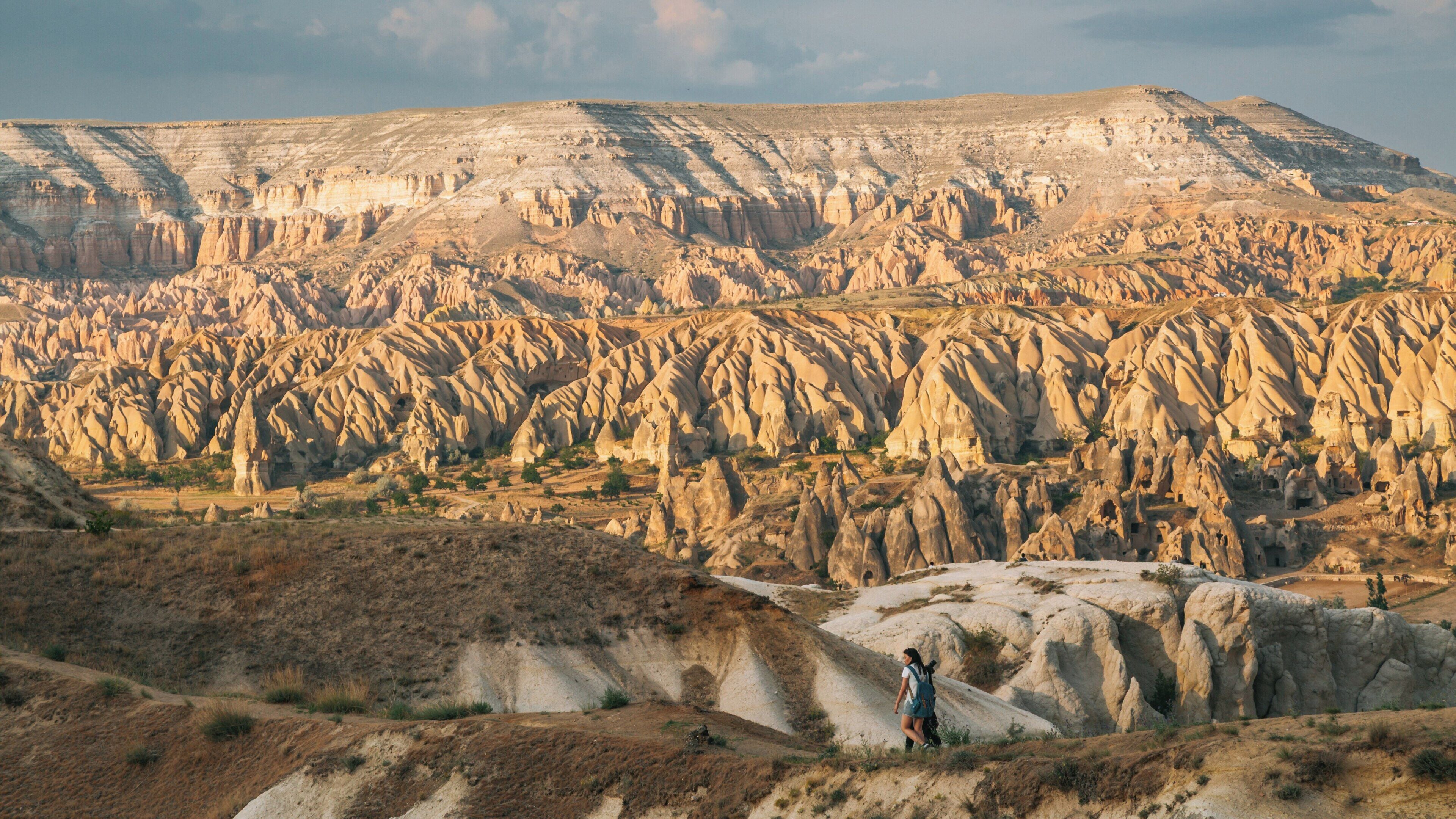 Stunning sunset view from Sunset Point in Urgup, Nevsehir, Turkey overlooking Cappadocia's unique landscape
