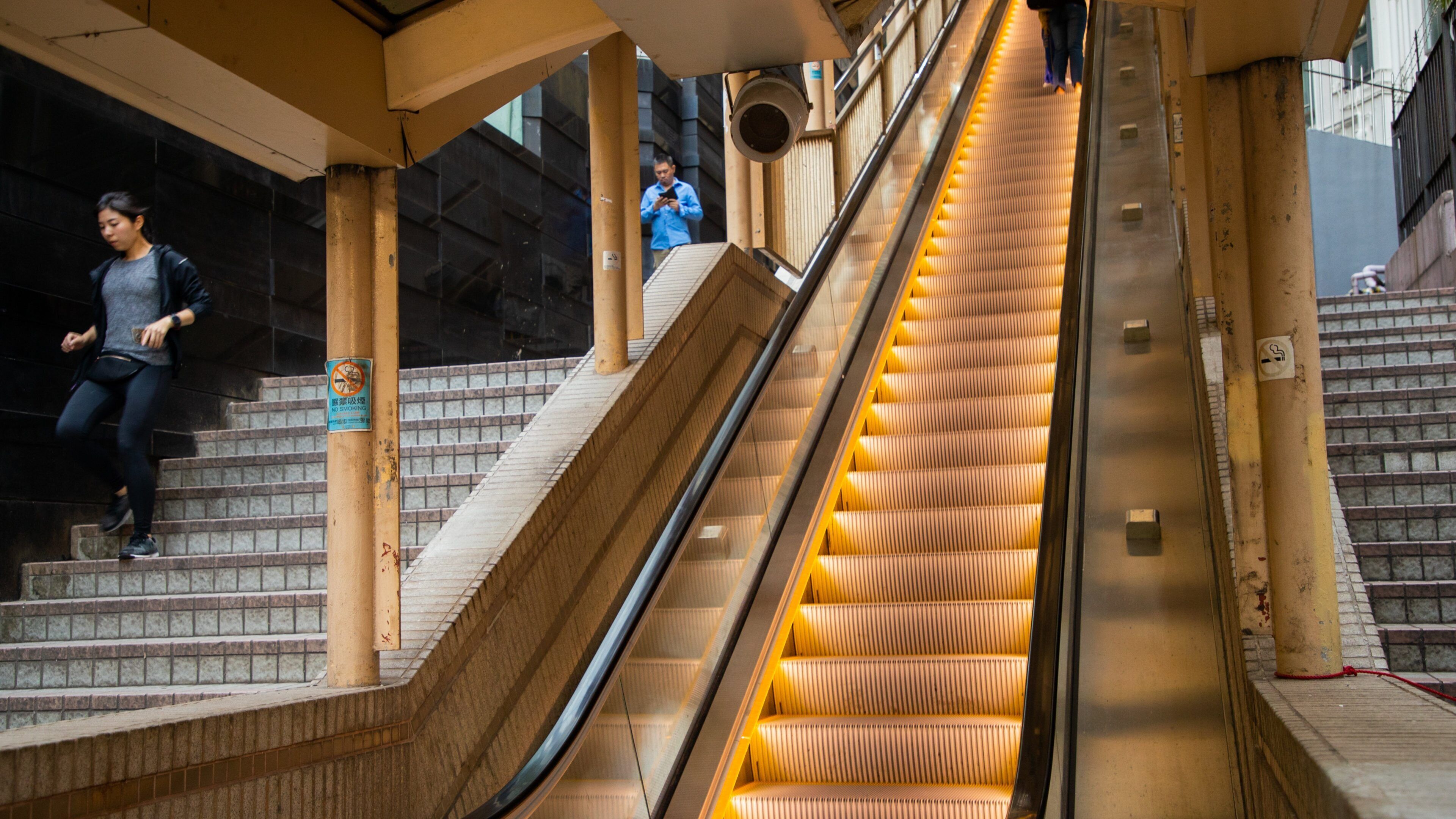 Mid-levels Escalators which includes street scenes