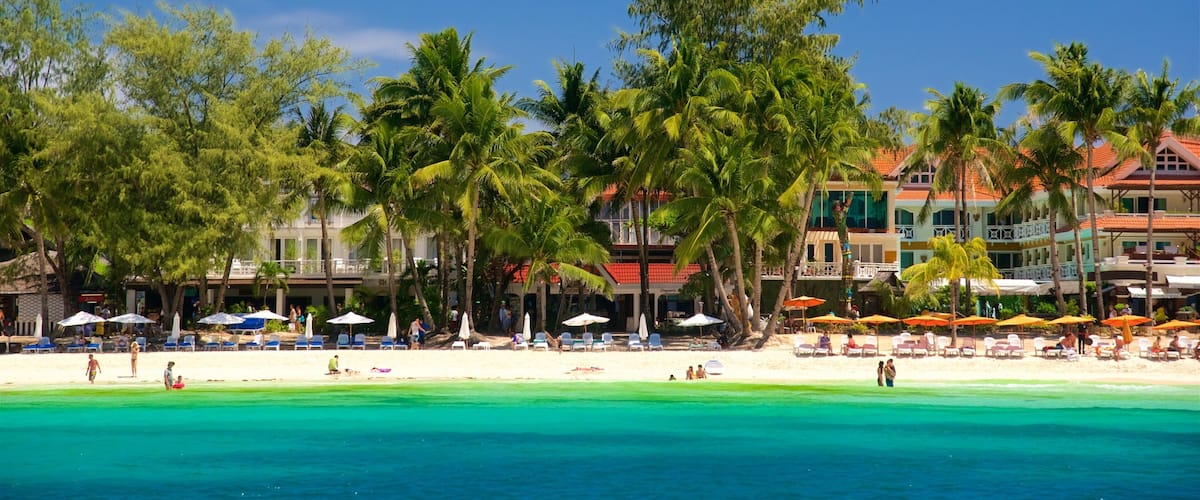 Aklan som inkluderer strand, luksushotell eller resort og tropisk landskap