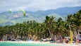 Bulabog Beach featuring parasailing, a beach and tropical scenes