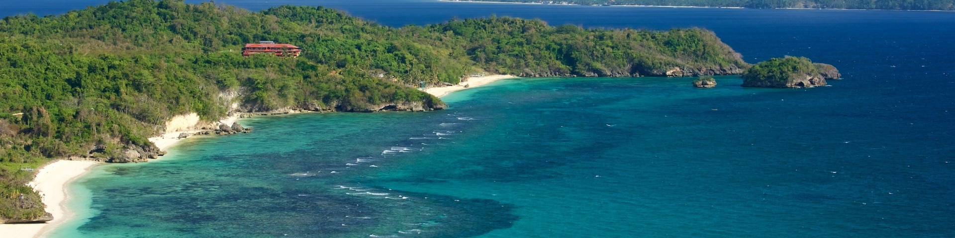 Mt. Luho showing island views, tropical scenes and a sandy beach