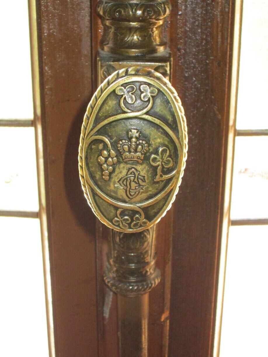 Intricately designed metal doorknob in Cantacuzino Castle.
