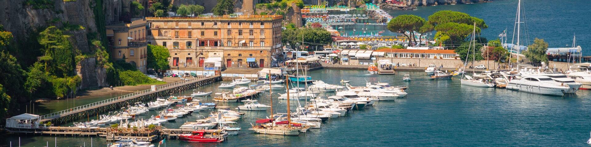 Port of Sorrento which includes a bay or harbor, a coastal town and general coastal views