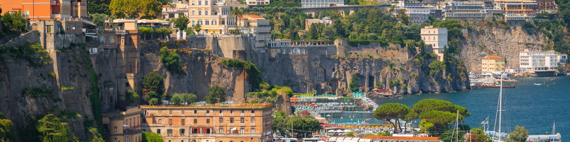 Port of Sorrento which includes a bay or harbor, a coastal town and general coastal views