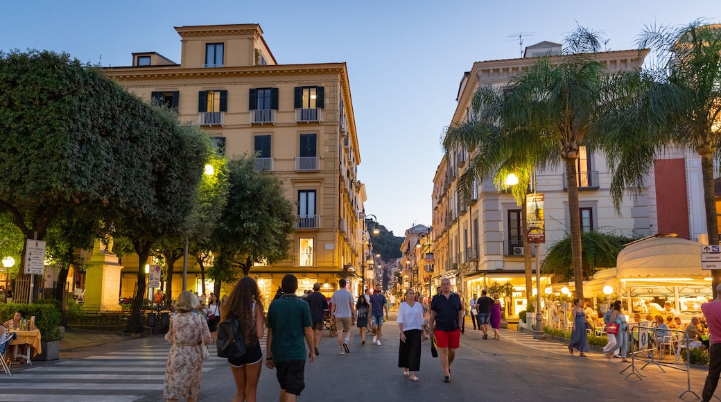Corso Italia which includes street scenes and night scenes as well as a small group of people