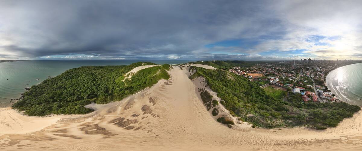 360 aerial photo taken with drone of Morro do Careca in Ponta Negra, Natal, Brazil