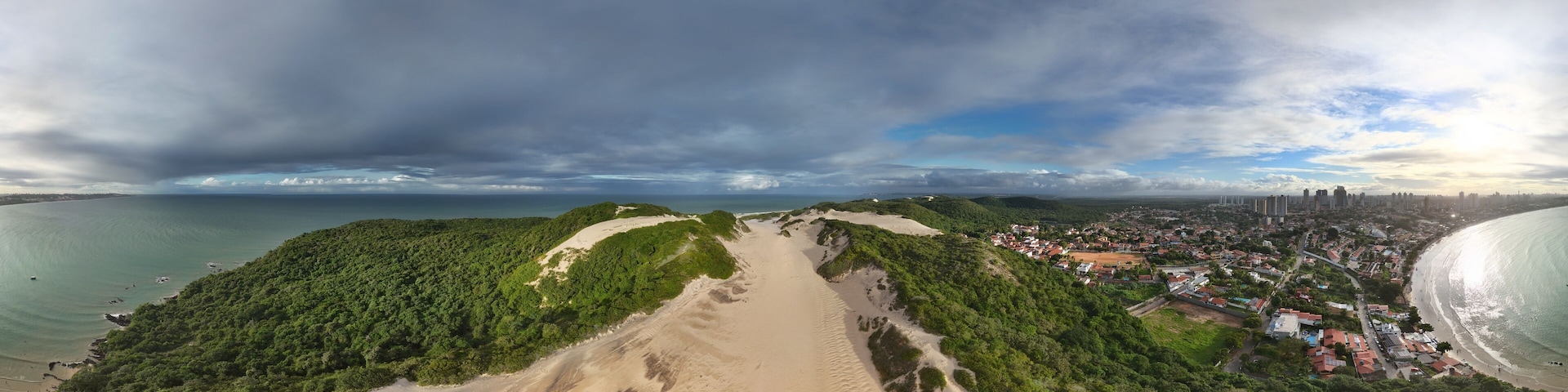 360 aerial photo taken with drone of Morro do Careca in Ponta Negra, Natal, Brazil