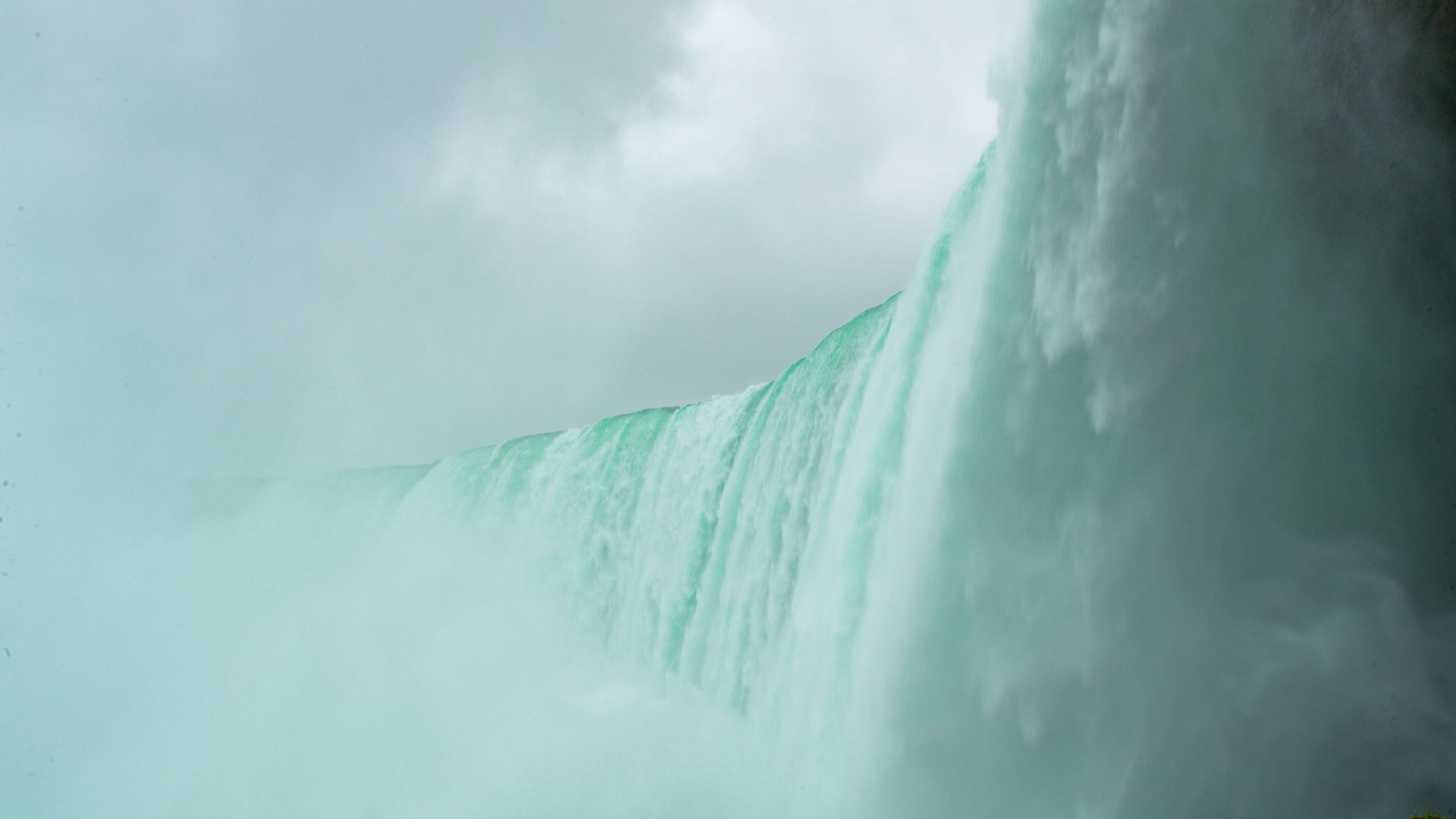 Journey Behind The Falls showing mist or fog and a waterfall