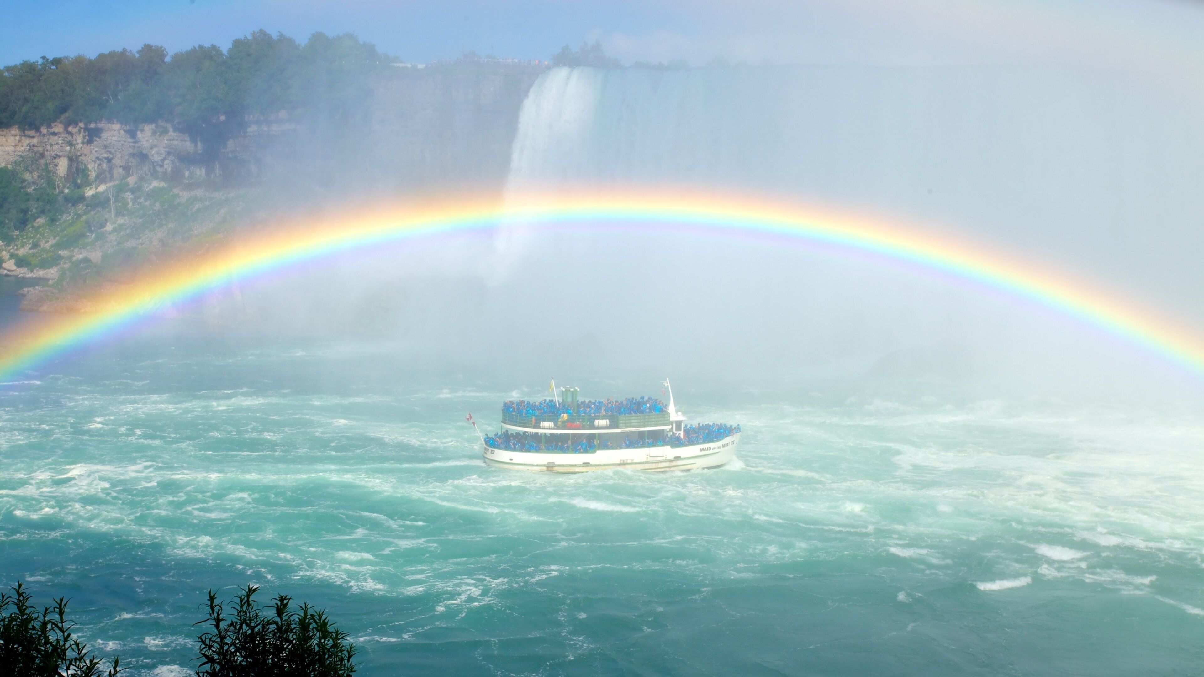 Journey Behind The Falls which includes a ferry, a river or creek and a waterfall