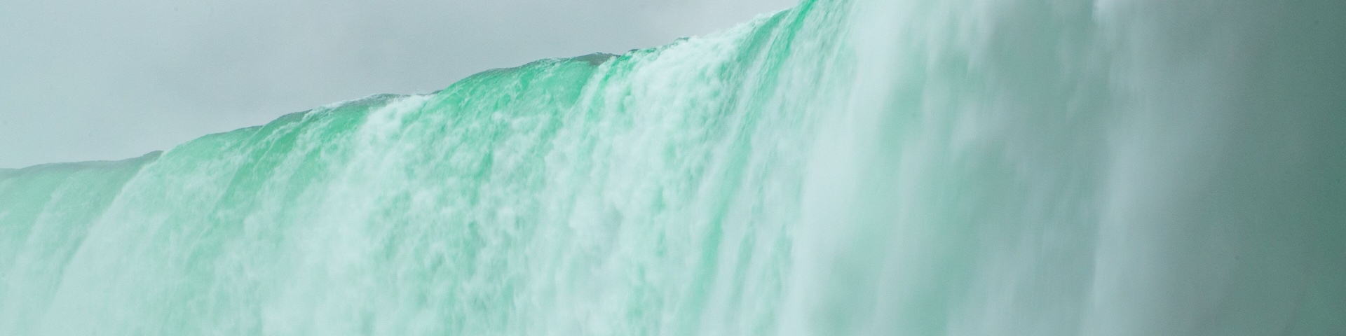 Journey Behind The Falls which includes a waterfall and mist or fog