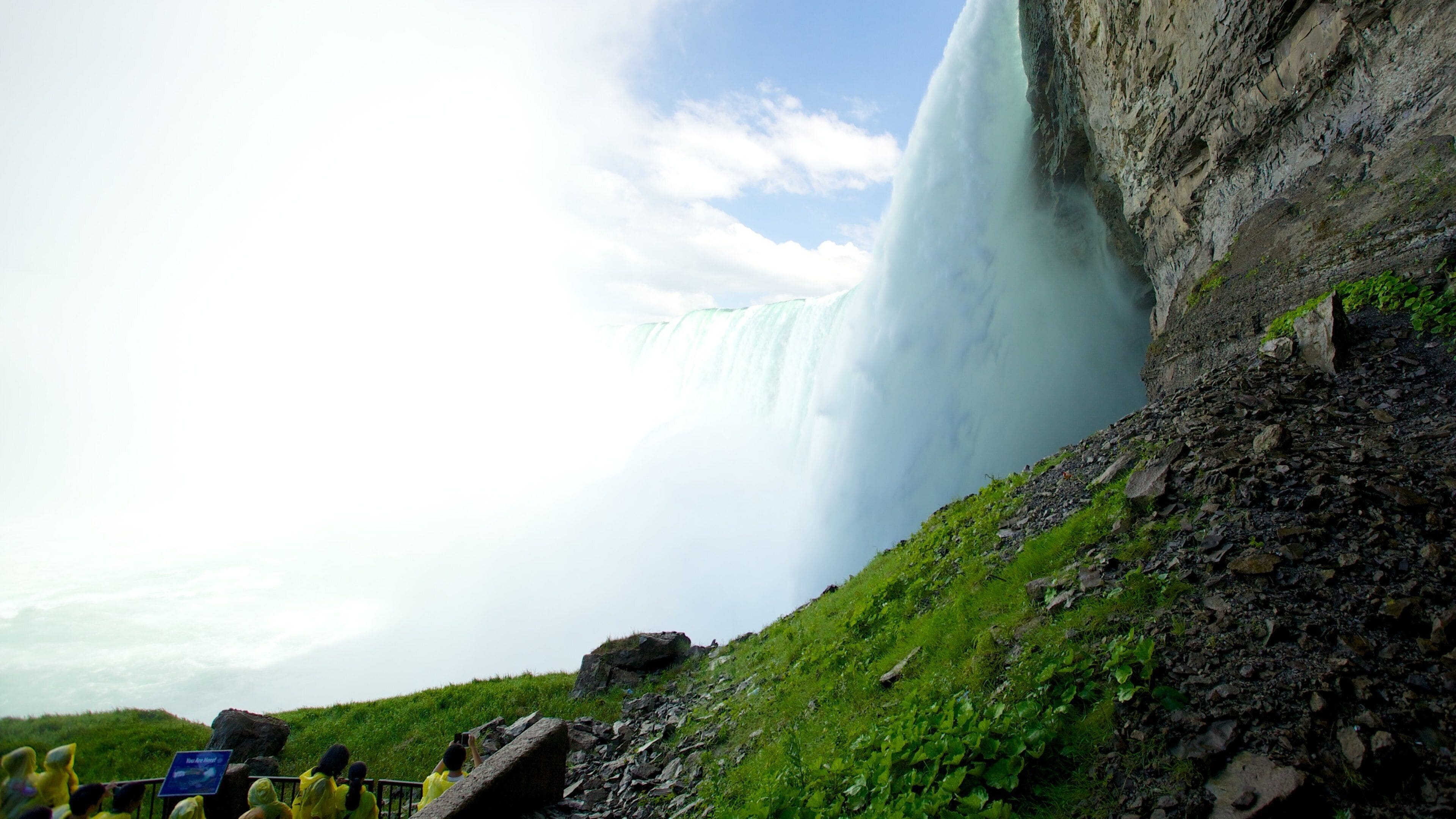 Journey Behind The Falls which includes a waterfall and views